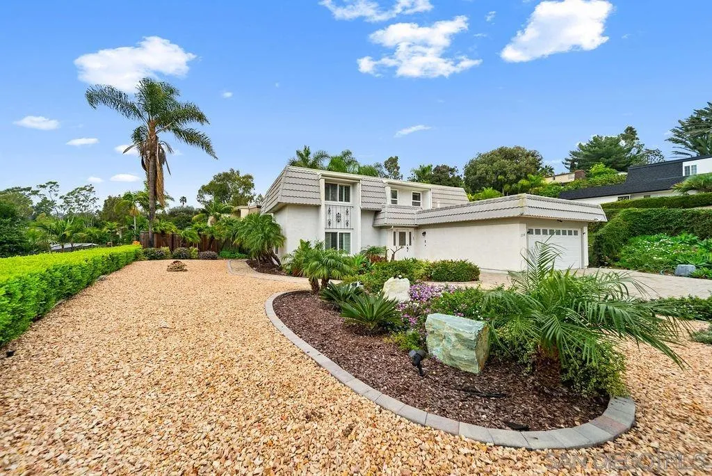 a view of a house with a garden