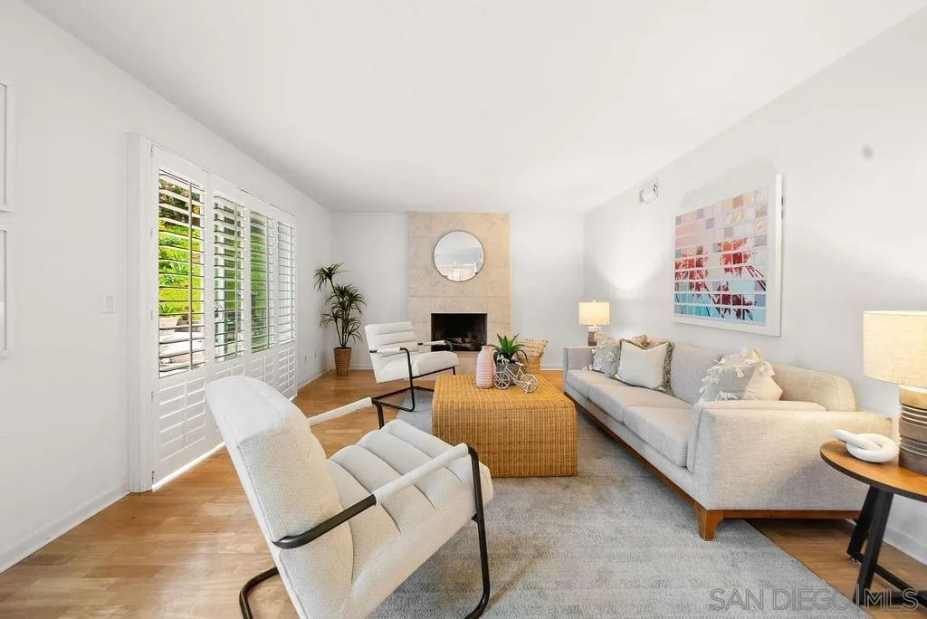 2210 Valley Road Oceanside, CA 92056 - Photo 11 of 45 a living room with furniture and a wooden floor