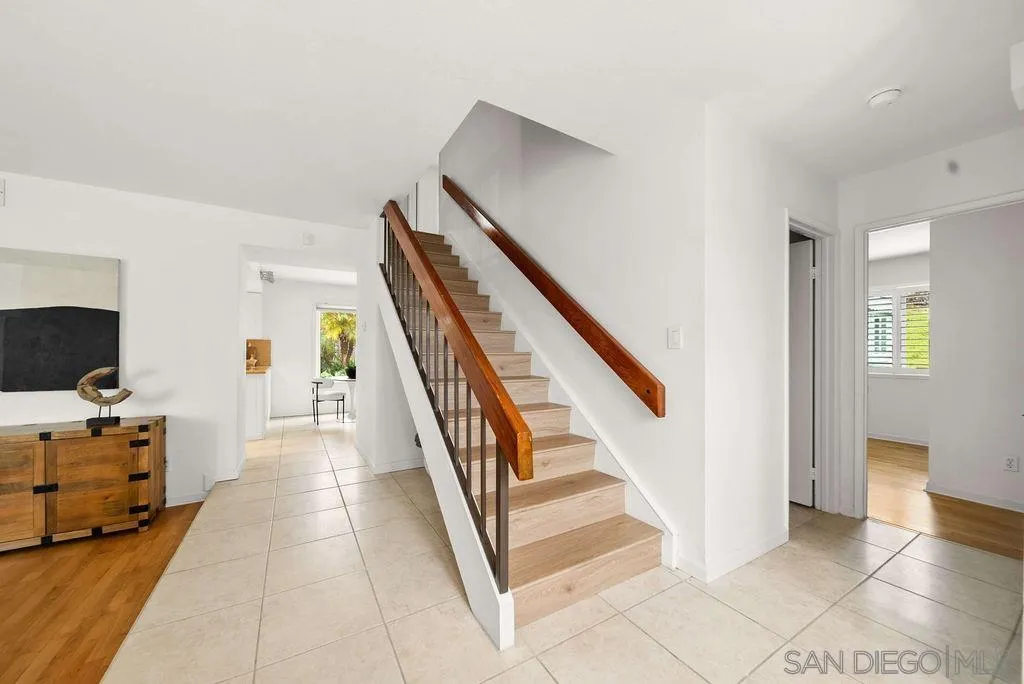 2210 Valley Road Oceanside, CA 92056 - Photo 13 of 45 a view of a hallway with workspace and stairs