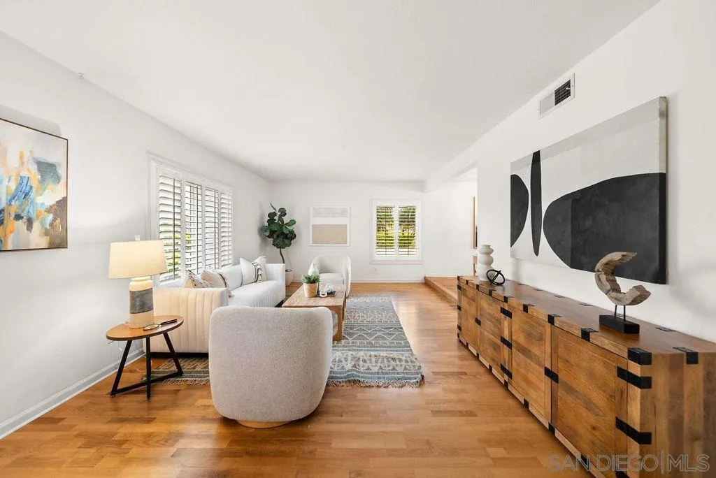 2210 Valley Road Oceanside, CA 92056 - Photo 4 of 45 a living room with furniture and a flat screen tv
