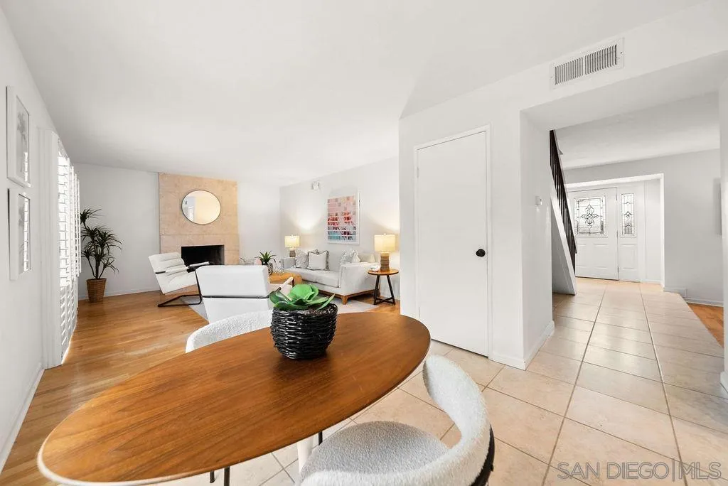 2210 Valley Road Oceanside, CA 92056 - Photo 9 of 45 a living room with furniture and a potted plant