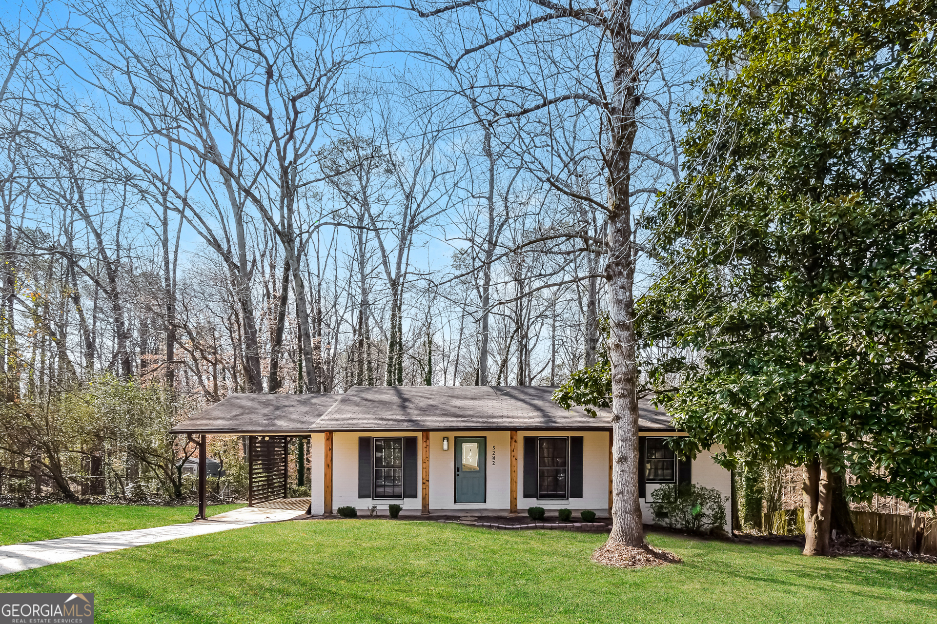 5282 Maple Valley Road Southwest Smyrna, GA 30126 - Photo 1 of 1 front view of a house with a yard