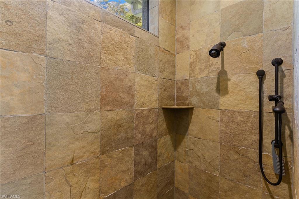 7506 Hogan Court Naples, FL 34113 - Photo 26 of 49 Bathroom view of tiled shower