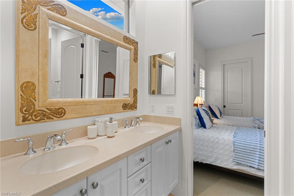 7506 Hogan Court Naples, FL 34113 - Photo 32 of 49 Ensuite bathroom with double vanity
