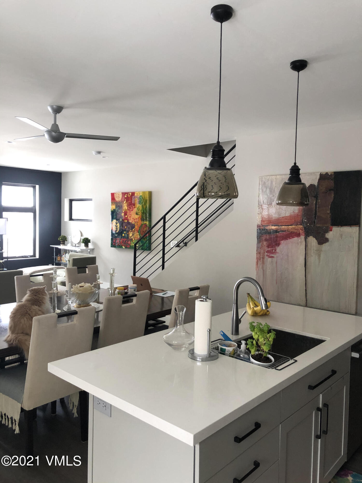 1133 Main Street Minturn, CO 81645 - Photo 4 of 13 a kitchen with a table a stove and cabinets