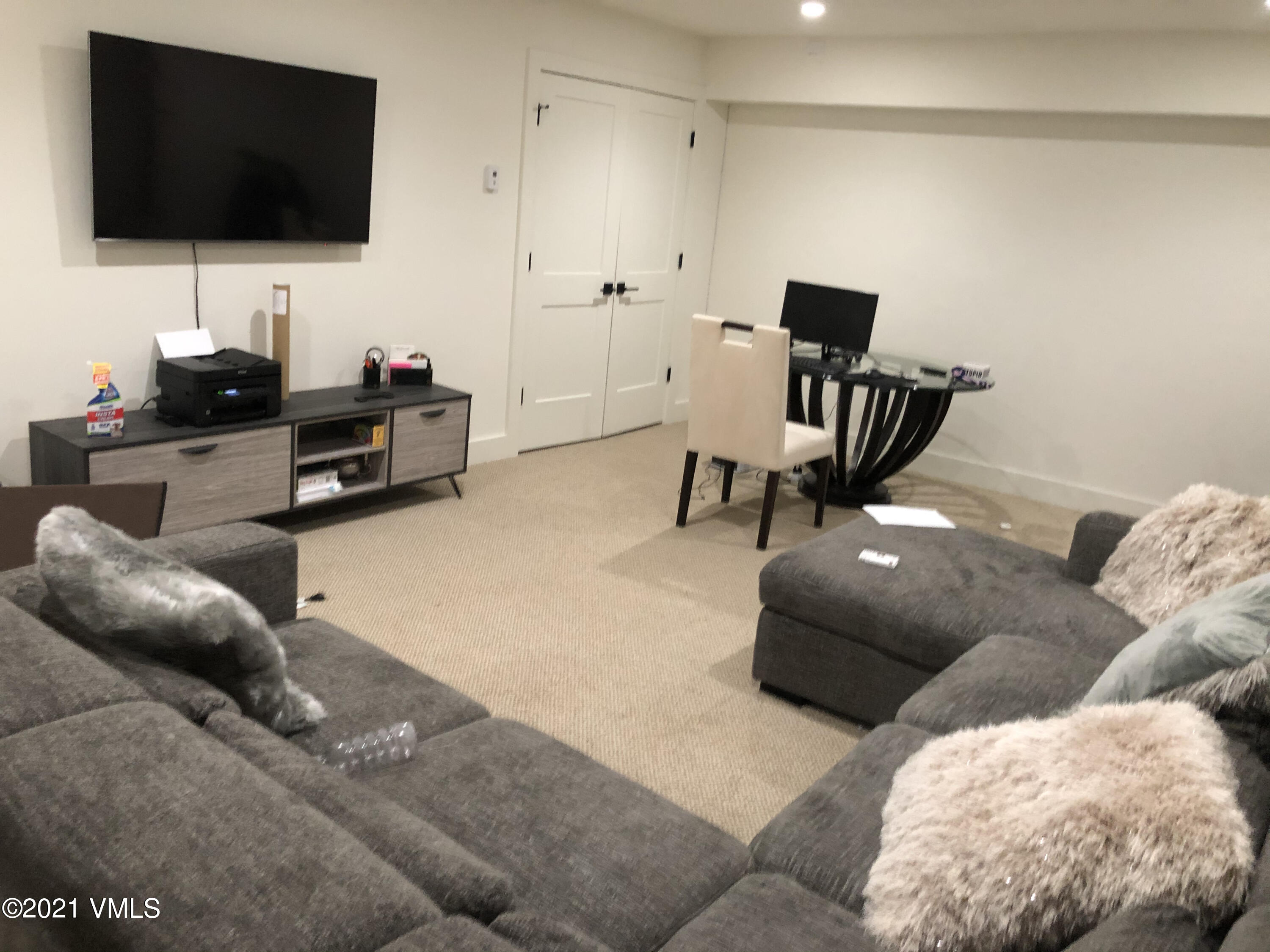 1133 Main Street Minturn, CO 81645 - Photo 5 of 13 a living room with furniture and a flat screen tv