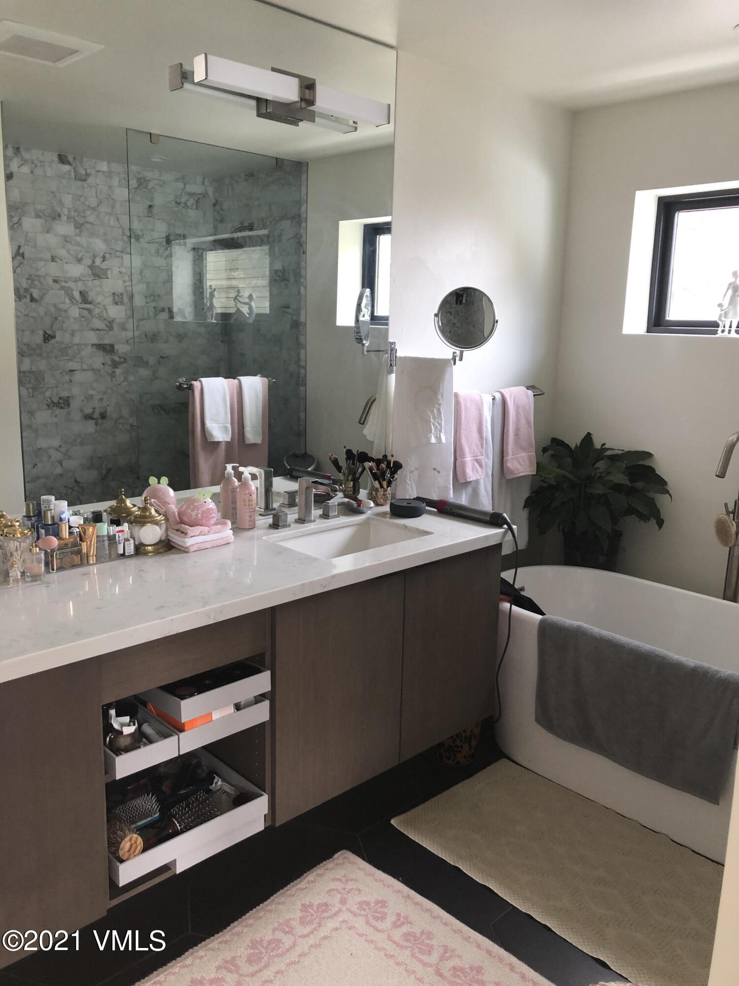 1133 Main Street Minturn, CO 81645 - Photo 7 of 13 a bathroom with a sink and a mirror