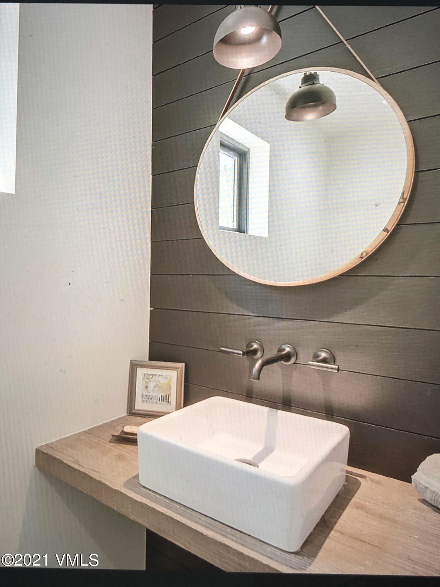 1133 Main Street Minturn, CO 81645 - Photo 8 of 13 a bathroom with a sink toilet and mirror