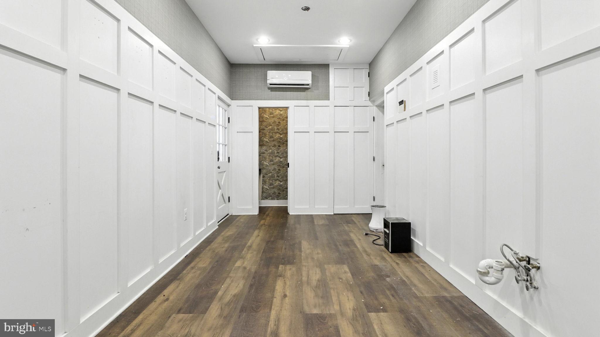 11305 Riverview Road Fort Washington, MD 20744 - Photo 15 of 59 a view of a hallway with wooden floor and entryway