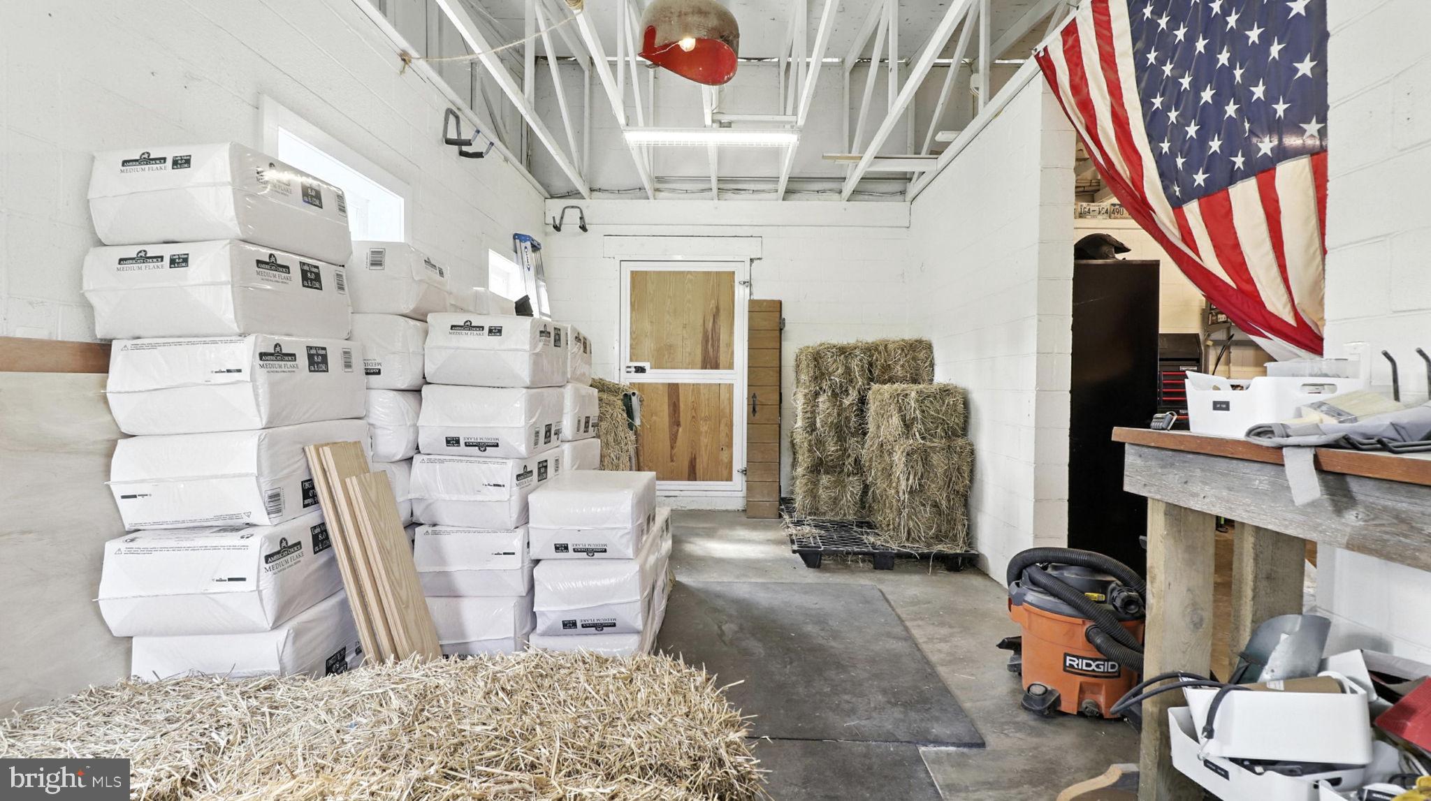 11305 Riverview Road Fort Washington, MD 20744 - Photo 21 of 59 a living room with lots of furniture and a chandelier