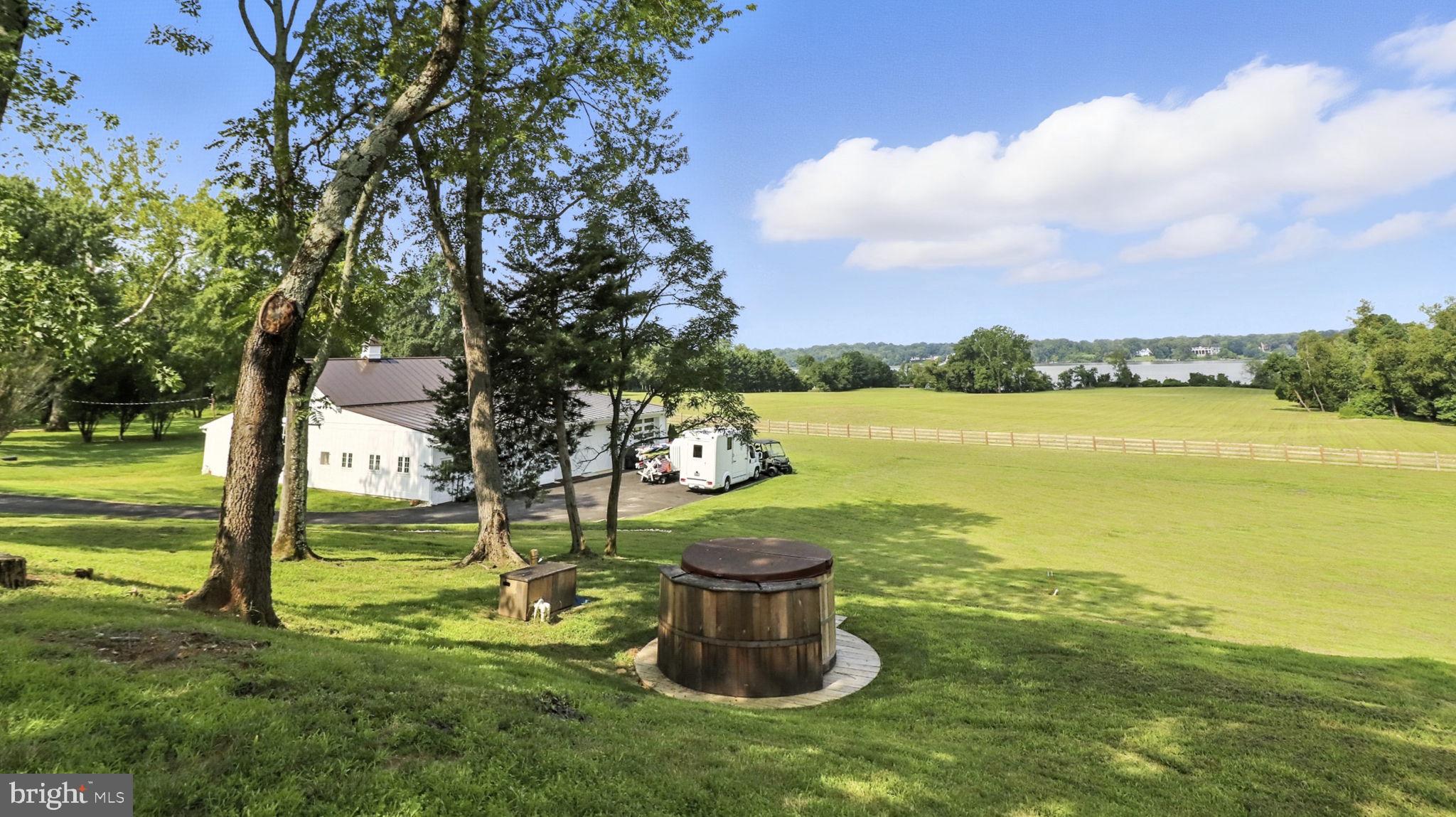 11305 Riverview Road Fort Washington, MD 20744 - Photo 28 of 59 a lake view with a big yard and large trees