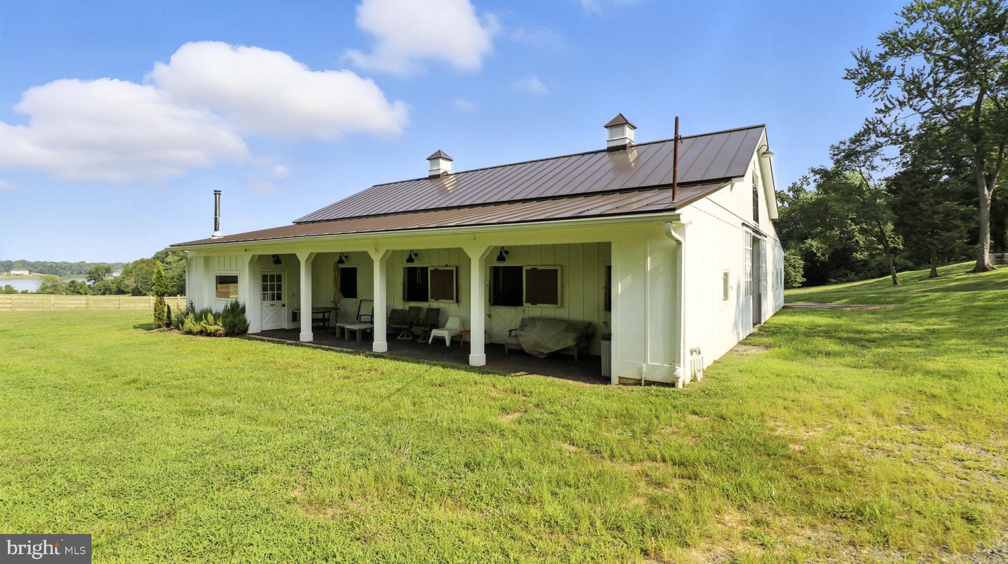 11305 Riverview Road Fort Washington, MD 20744 - Photo 3 of 59 a view of a house with backyard and porch