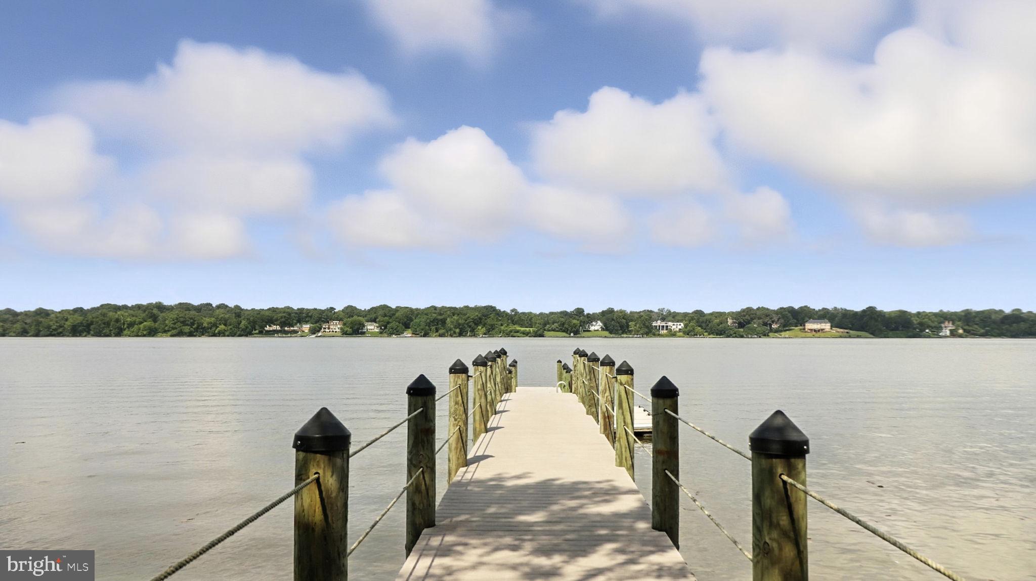 11305 Riverview Road Fort Washington, MD 20744 - Photo 34 of 59 a front view of a lake with a mountain in the background