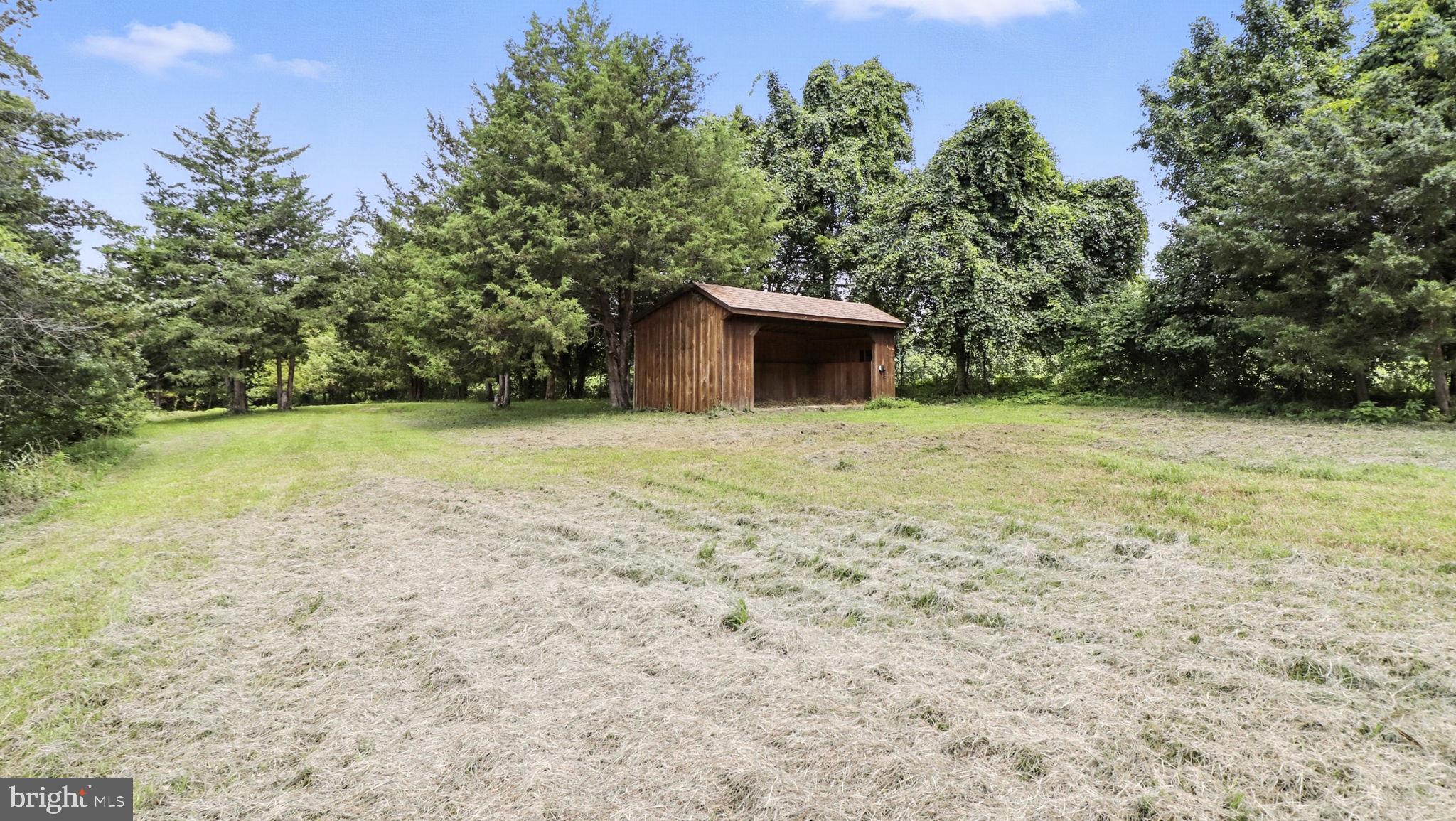 11305 Riverview Road Fort Washington, MD 20744 - Photo 40 of 59 a view of outdoor space with deck and yard