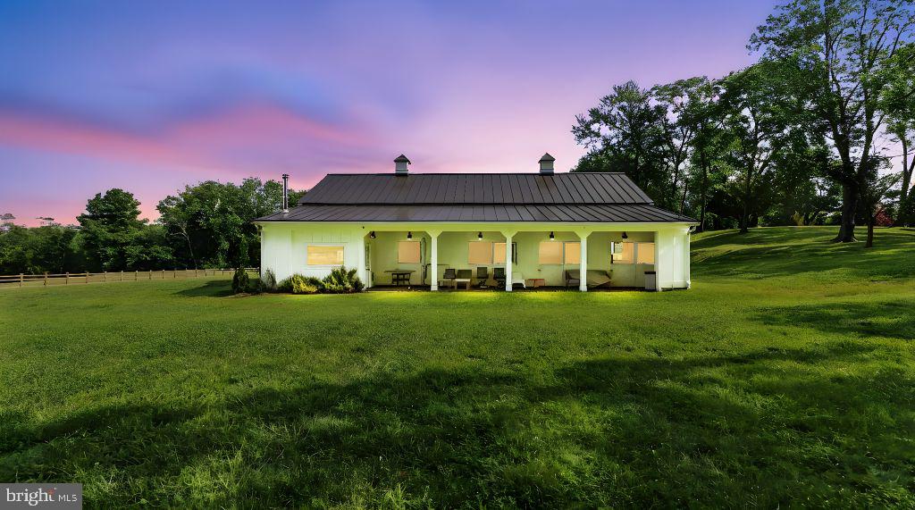 11305 Riverview Road Fort Washington, MD 20744 - Photo 59 of 59 a front view of a house with a garden