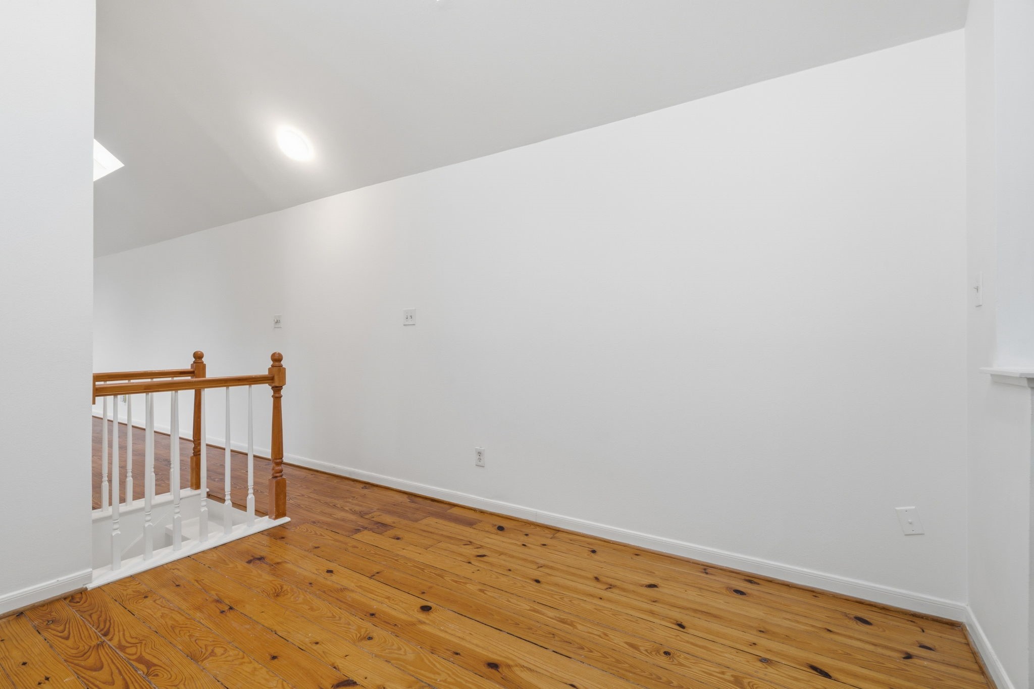 1616 Kipling Street, Unit C Houston, TX 77006 - Photo 6 of 34 a view of hallway with wooden floor