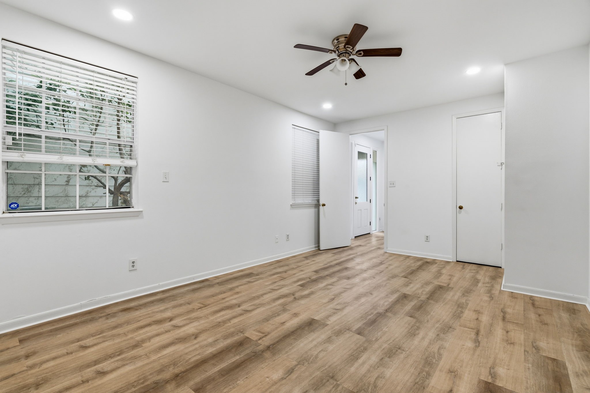1616 Kipling Street, Unit C Houston, TX 77006 - Photo 9 of 34 a view of a room with a ceiling fan and a window