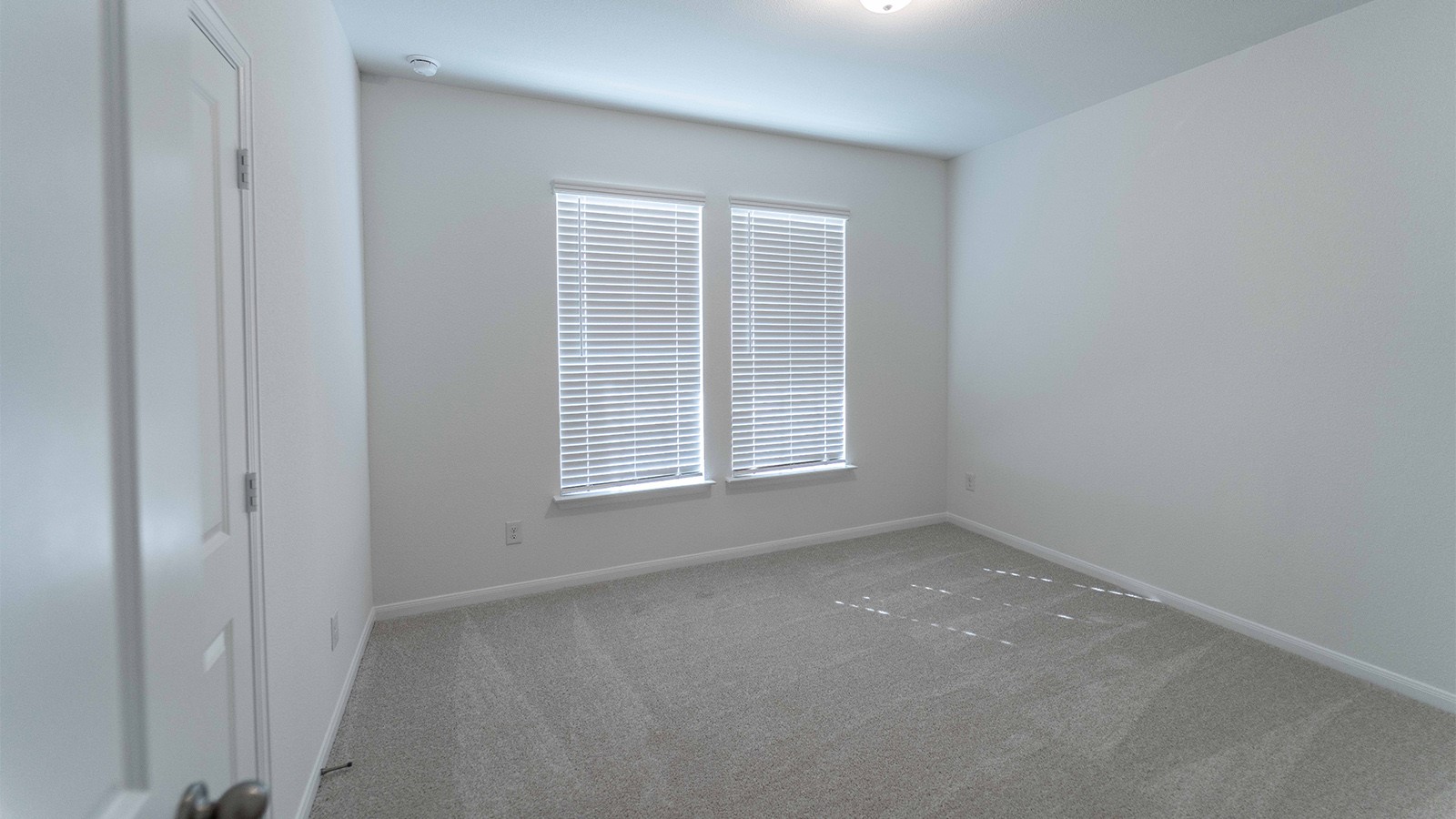 251 Grey Leaf Road Buda, TX 78610 - Photo 16 of 17 Unfurnished room with carpet and baseboards