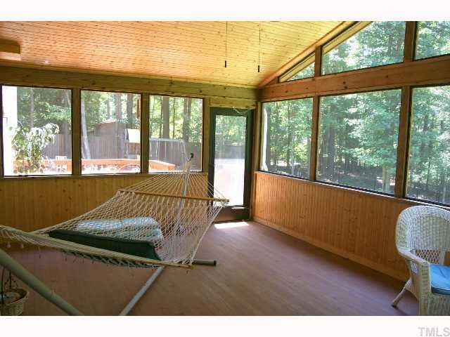 10921 Bridle Lane Raleigh, NC 27614 - Photo 7 of 12 RELAX ON YOUR LARGE SCREENED IN PORCH AND ENJOY NATURE