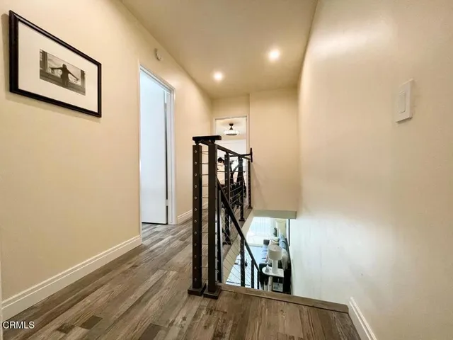 a view of entryway with wooden floor