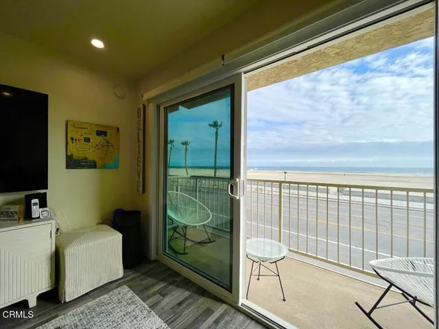 a view of a balcony with an ocean view