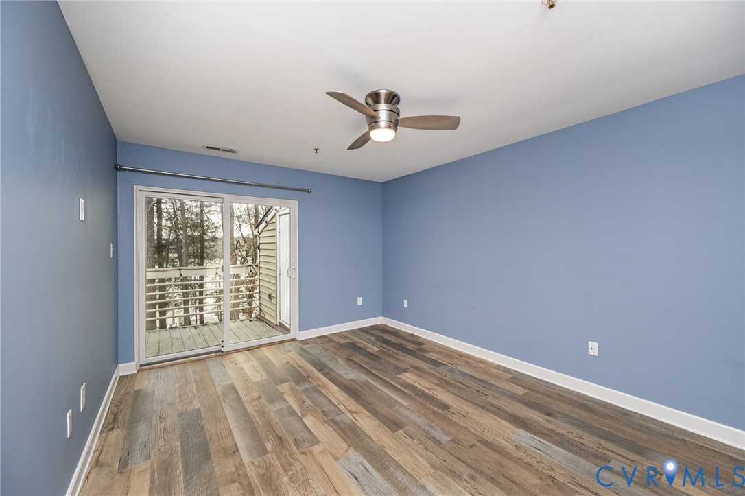 112 Water Pointe Court Midlothian, VA 23112 - Photo 17 of 32 wooden floor in an empty room with a window