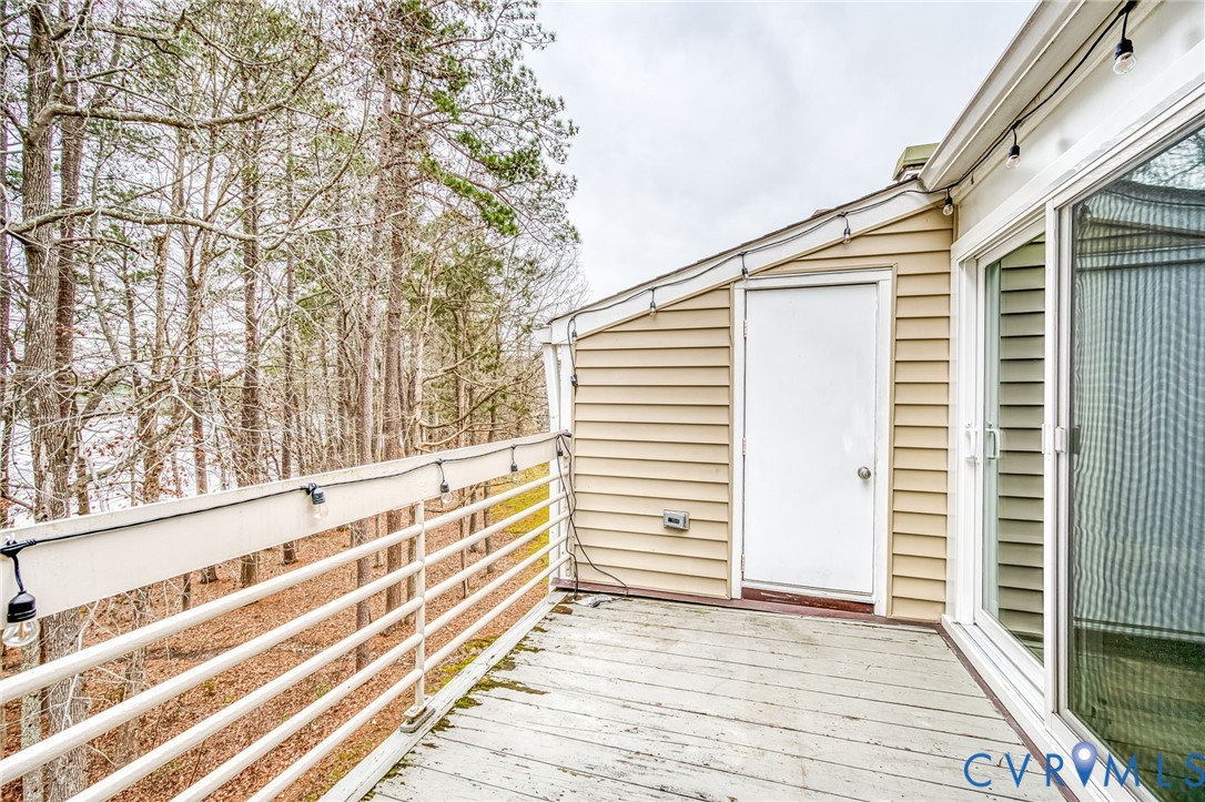 112 Water Pointe Court Midlothian, VA 23112 - Photo 24 of 32 a view of a balcony with wooden floor and fence