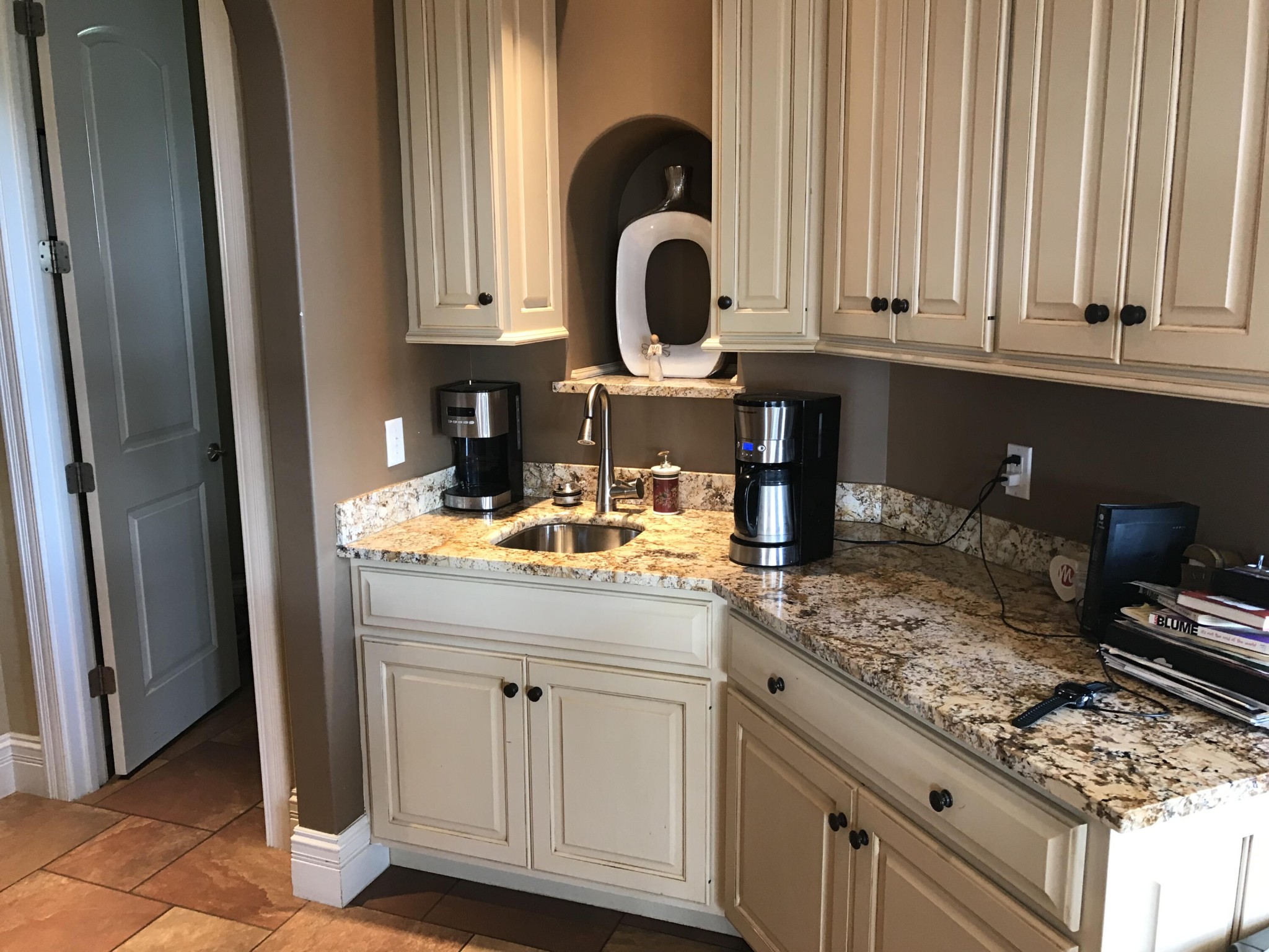 1951 Hindley Road Morristown, TN 37813 - Photo 12 of 26 a kitchen with a sink and a stove with white cabinets