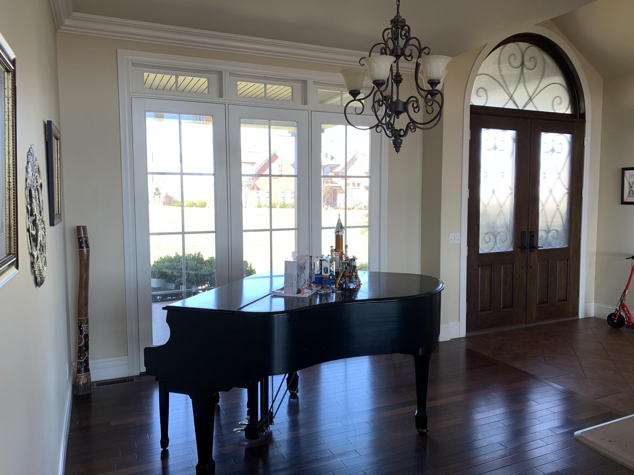 1951 Hindley Road Morristown, TN 37813 - Photo 8 of 26 a dining room with wooden floor a chandelier a glass table and chairs