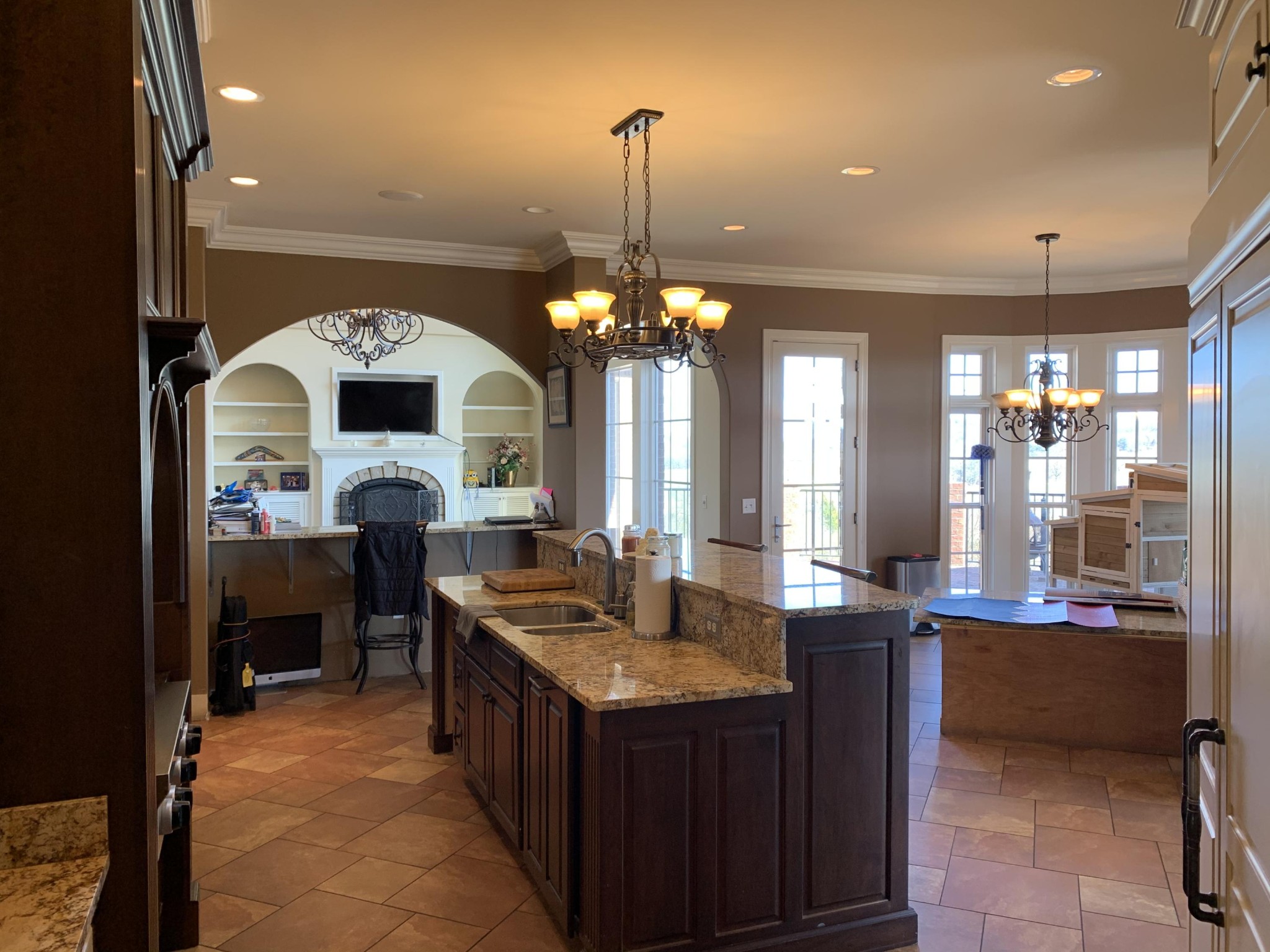1951 Hindley Road Morristown, TN 37813 - Photo 10 of 26 a kitchen with kitchen island granite countertop a sink and a large mirror