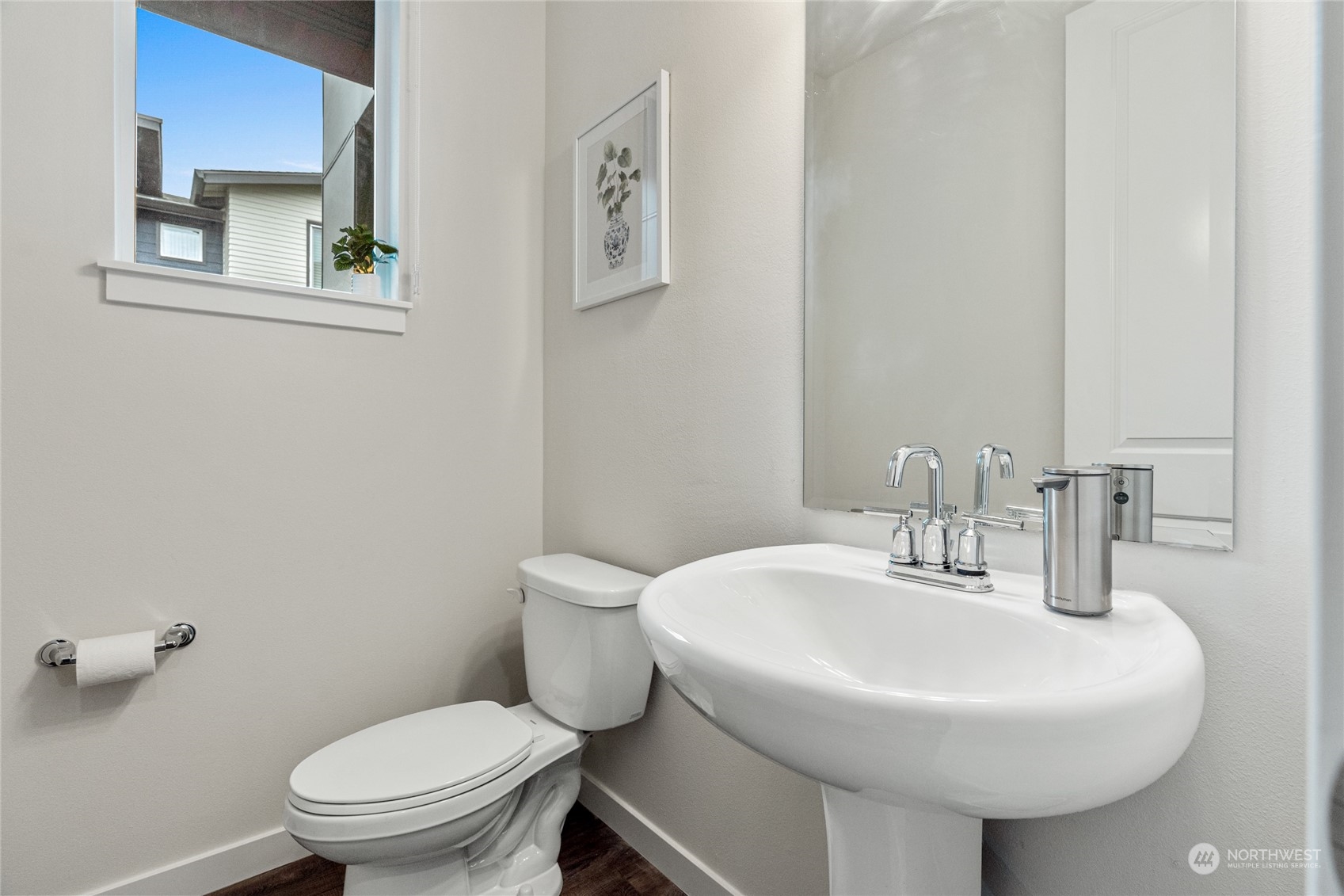 616 237th Place Southeast, Unit F Bothell, WA 98021 - Photo 17 of 27 a bathroom with a toilet sink and mirror