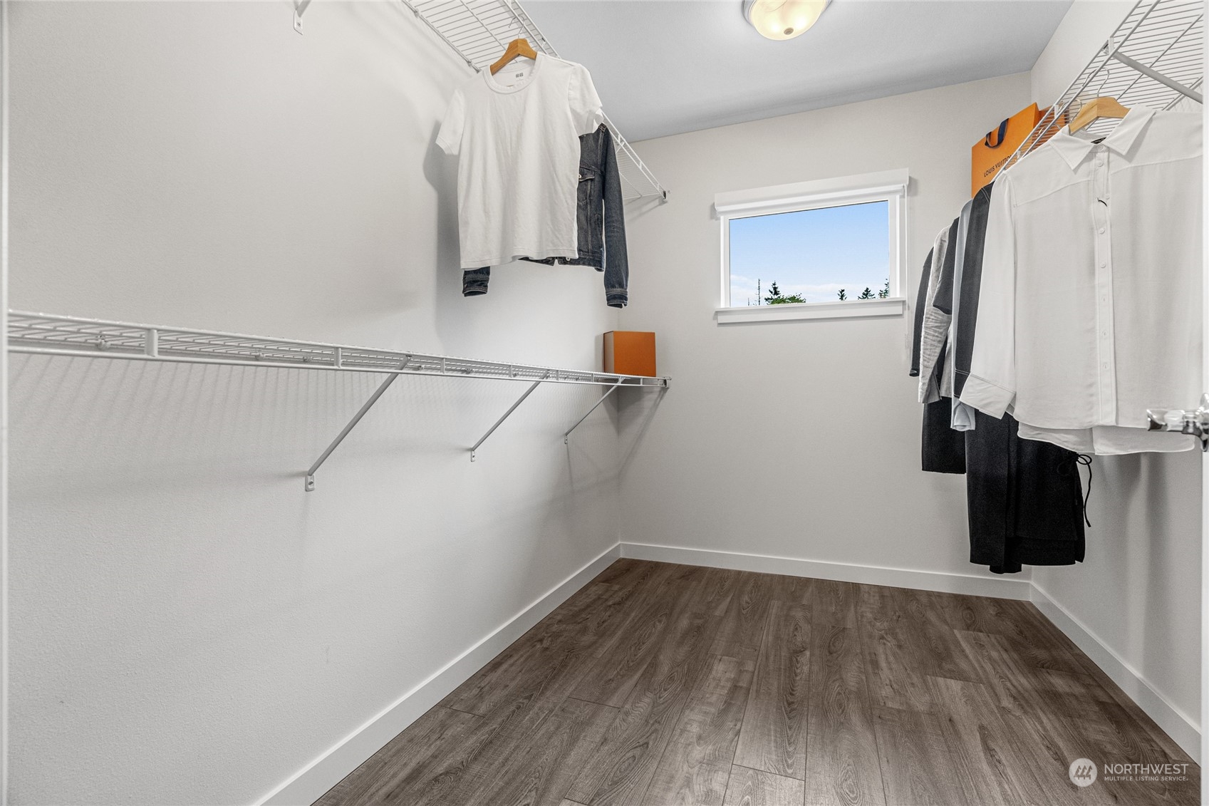 616 237th Place Southeast, Unit F Bothell, WA 98021 - Photo 27 of 27 a view of walk in closet with clothes and shoes