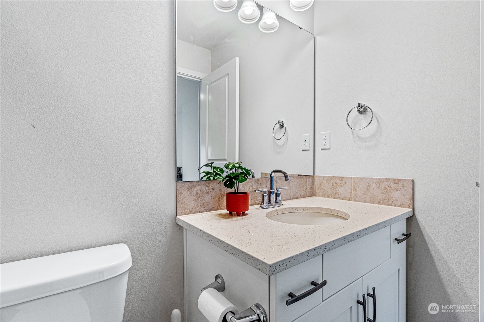 616 237th Place Southeast, Unit F Bothell, WA 98021 - Photo 7 of 27 a bathroom with a sink vanity and toilet