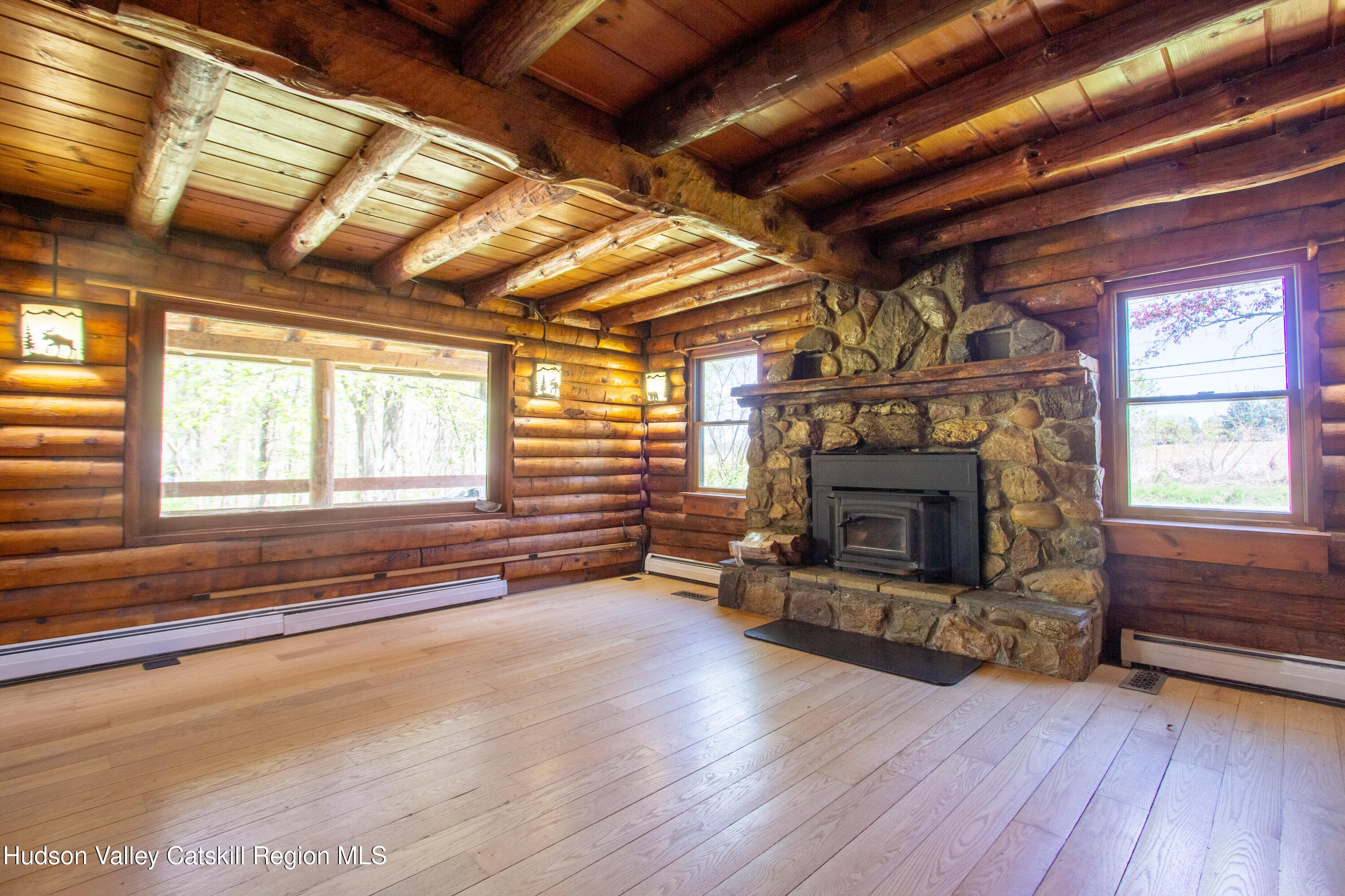 205 Fordham Road Valatie, NY 12184 - Photo 5 of 18 a living room with furniture and a fireplace