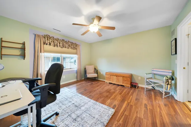 a workspace with wooden floor