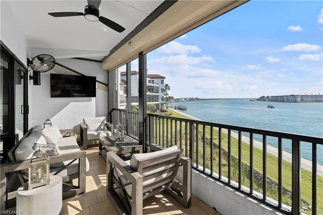 a view of balcony with furniture