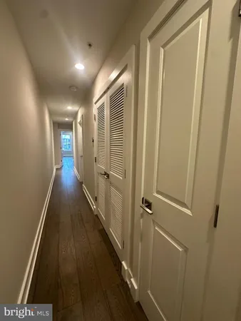 an empty room with a empty space and a window