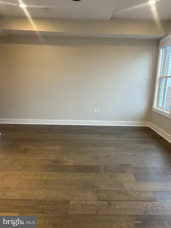 a room with gym equipment and a shower