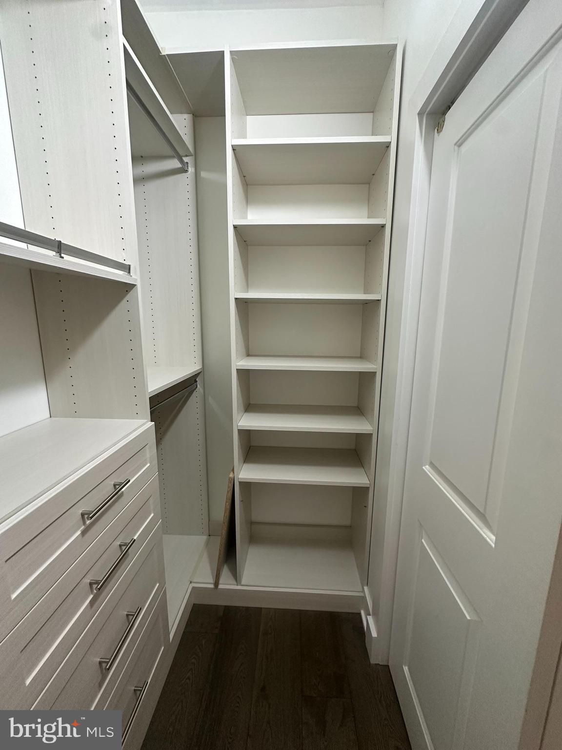 1852 3rd Street Northwest, Unit C Washington, DC 20001 - Photo 47 of 56 a view of walk in closet with empty racks