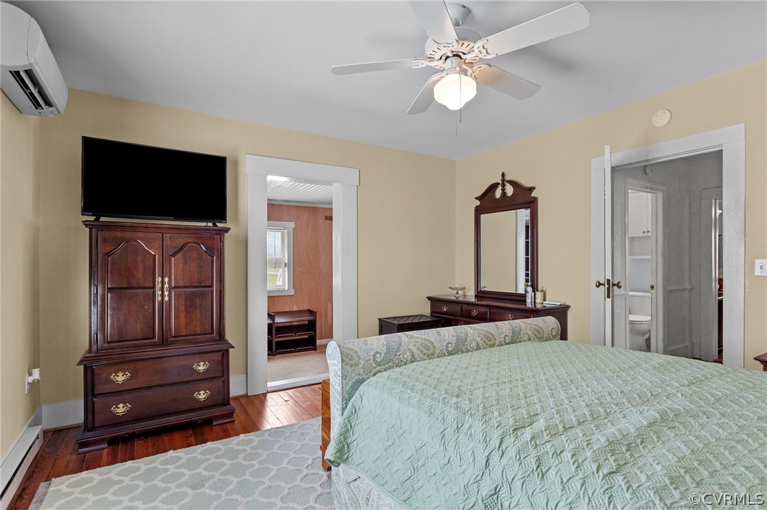 4851 Three Chopt Road Louisa, VA 23093 - Photo 13 of 39 a bedroom with a bed and a television