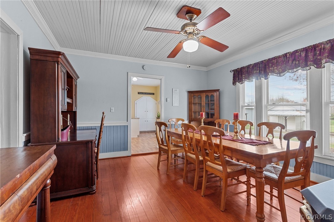4851 Three Chopt Road Louisa, VA 23093 - Photo 24 of 39 a view of a dining room with furniture window and wooden floor