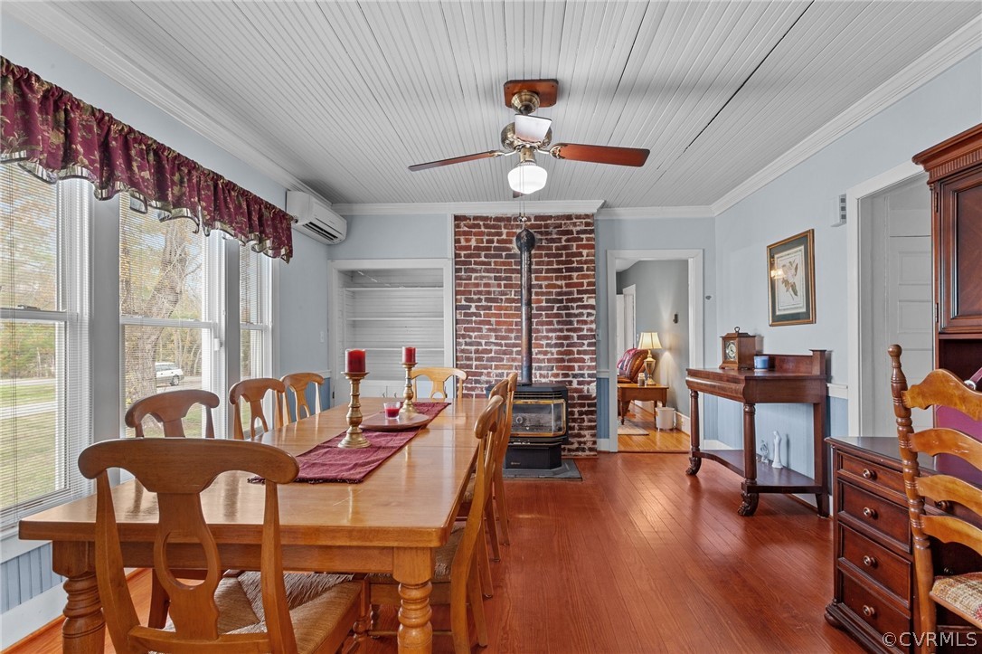 4851 Three Chopt Road Louisa, VA 23093 - Photo 25 of 39 a view of a dining room with furniture window and wooden floor