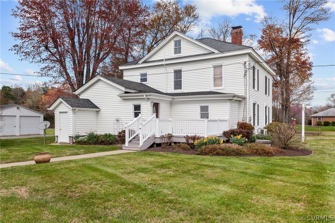 4851 Three Chopt Road Louisa, VA 23093 - Photo 28 of 39 a front view of a house with a yard and trees