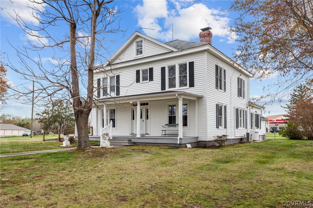 4851 Three Chopt Road Louisa, VA 23093 - Photo 29 of 39 a front view of a house with a yard