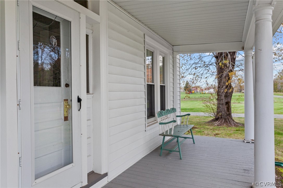 4851 Three Chopt Road Louisa, VA 23093 - Photo 30 of 39 a view of a porch with chairs and backyard