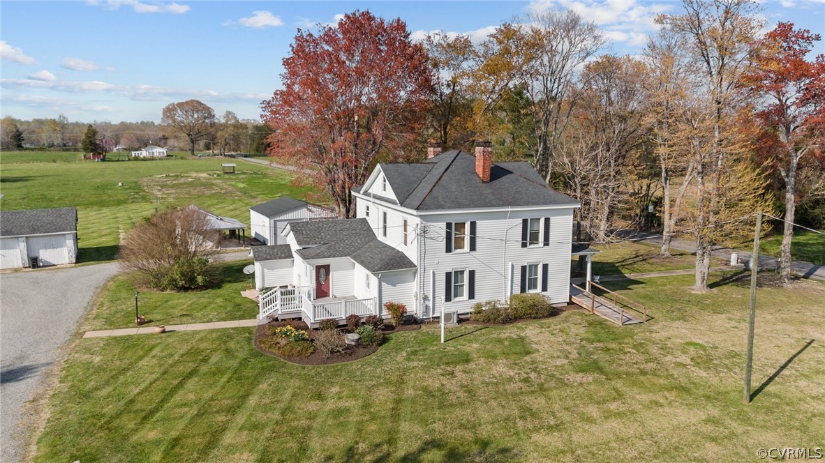 4851 Three Chopt Road Louisa, VA 23093 - Photo 3 of 39 a front view of a house with garden