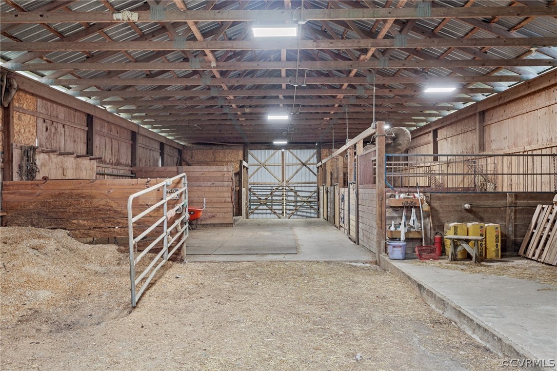 4851 Three Chopt Road Louisa, VA 23093 - Photo 32 of 39 a view of a garage with wooden ceiling