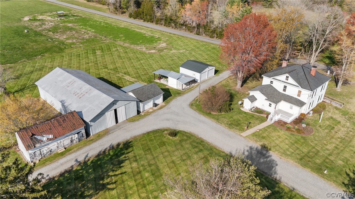 4851 Three Chopt Road Louisa, VA 23093 - Photo 36 of 39 an aerial view of a house with a garden and lake view