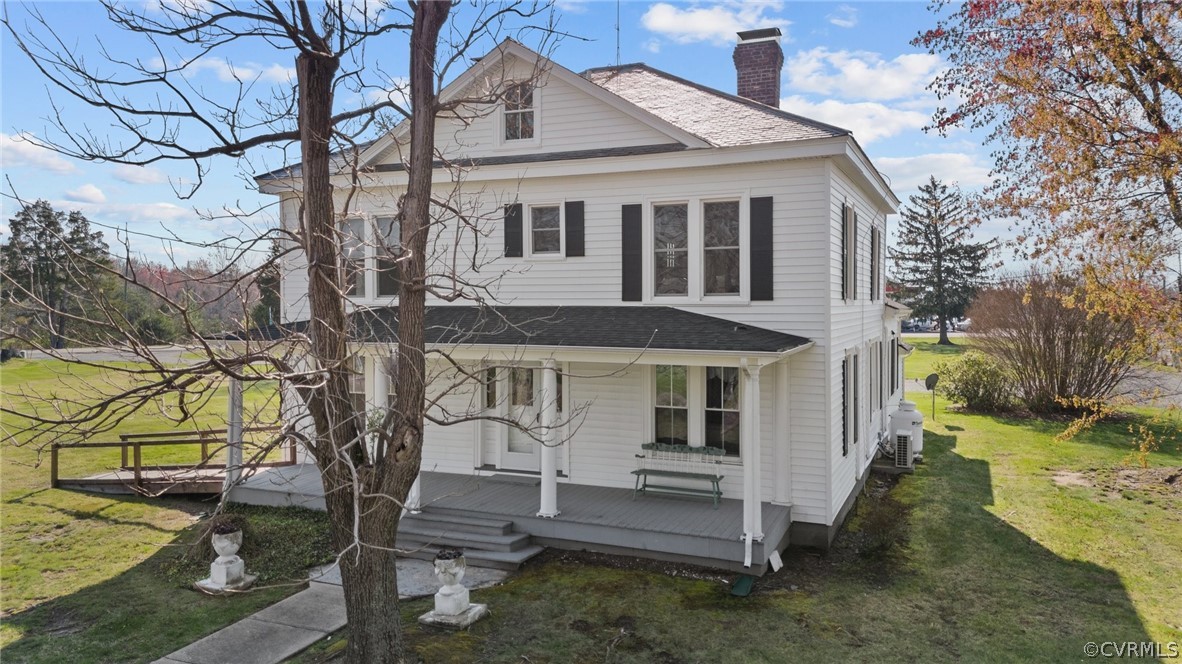 4851 Three Chopt Road Louisa, VA 23093 - Photo 6 of 39 a white house that has tree in front of it