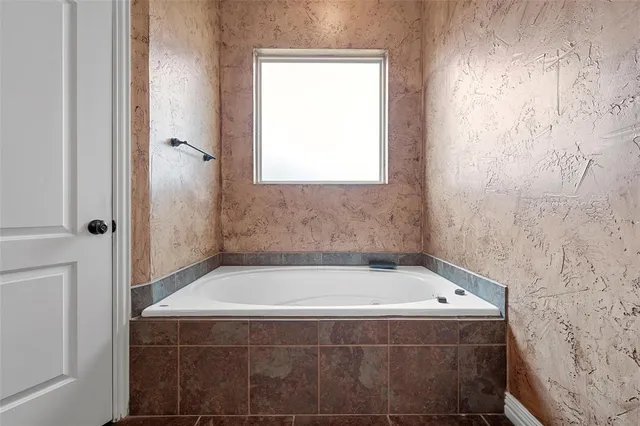 a bathroom with a bathtub